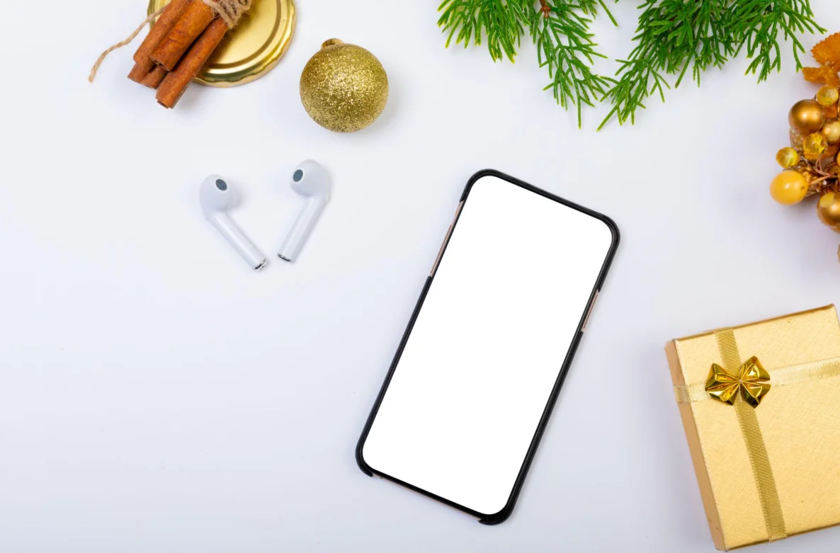 martphones, wireless earbuds and tablets displayed during a festive technology sale